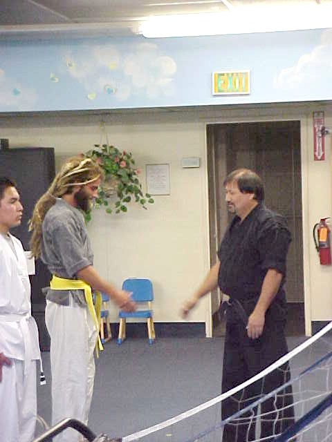 claytongetsyellowbeltfromdoug.jpg